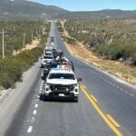 Escolta Guardia Estatal caravana de 250 vehículos de paisanos en la Carretera Federal 101