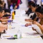 Recibieron padres de familia Tarjetas de Becas Rita Cetina en el Auditorio Municipal